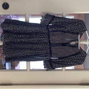 Peasant style dress in Rayon. Side zipper at skirt